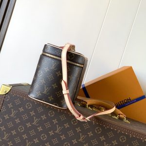 Alternative view of M42265 Burgundy  M28340 White  M12667 Green  M12668 Blue  M12671 Bright Red  M14886 Rose Red Small is beautiful. Inspired by the iconic NICE cosmetic bag, this elegant toiletry case is a personalized choice for carrying beauty essentials.A hidden zippered pocket inside the flap secures valuables.18 x 14.5 x 24 cm (H x W x L) Monogram coated canvas Coated canvas Washable lining Leather trim Brass hardware Double zipper closure Ample capacity Zipper pocket inside flap Multiple interior slip pockets Made in France, Spain, Italy, or the USA. Handles: Single handle